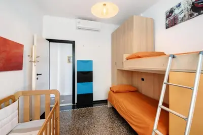 Letto o letti in una camera di Attico in centro vista mare