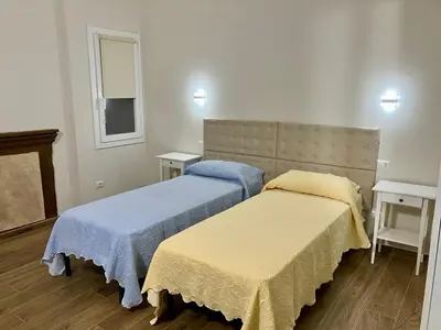 Letto o letti in una camera di Antico Casale San Pantaleone