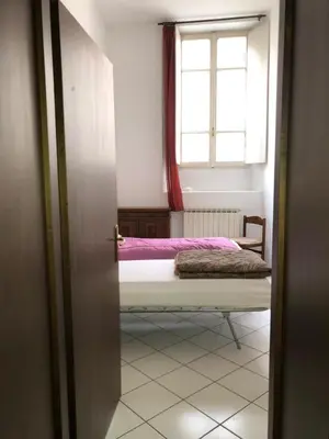 Letto o letti in una camera di Volturno Palace