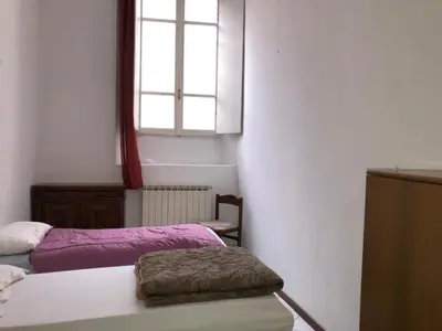 Letto o letti in una camera di Volturno Palace