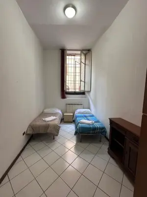 Letto o letti in una camera di Volturno Palace