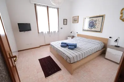 Letto o letti in una camera di Perla Blu by PortofinoVacanze