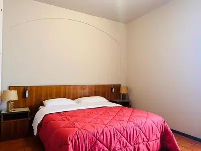 Letto o letti in una camera di Hotel Business