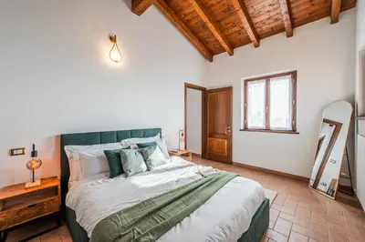 Letto o letti in una camera di Green Hill Maranello, Vista e Relax