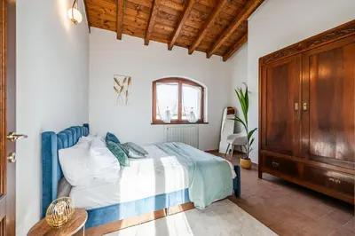 Letto o letti in una camera di Green Hill Maranello, Vista e Relax