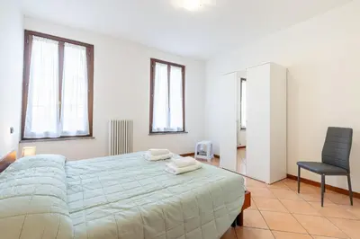 Letto o letti in una camera di GuestHost - Casa Emilia - cozy apartment in Parma