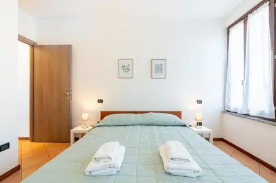 Letto o letti in una camera di GuestHost - Casa Emilia - cozy apartment in Parma