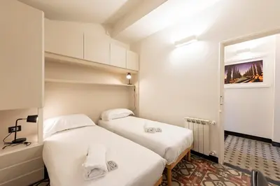 Letto o letti in una camera di JOIVY Bright 2BR flat, moments from the beach