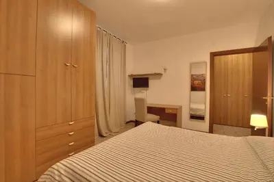 Letto o letti in una camera di Residence il Cascinetto