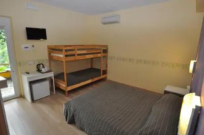 Letto o letti in una camera di Agriturismo Costa di Campo