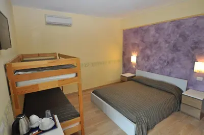 Letto o letti in una camera di Agriturismo Costa di Campo