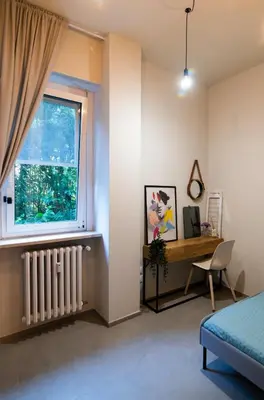 Letto o letti in una camera di SP2Apartment Viale Golgi 80