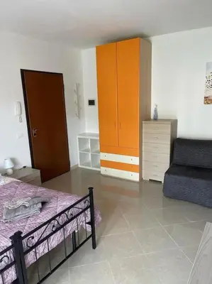 Letto o letti in una camera di Affittacamere Da Maria 3