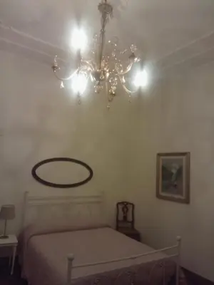 Letto o letti in una camera di Piacenza centro