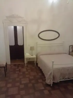 Letto o letti in una camera di Piacenza centro