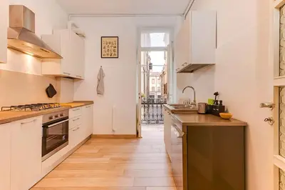 Cucina o angolo cottura di RELAX - Historic Center with 3 Bedrooms and Free ZTL Pass