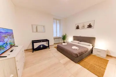 Letto o letti in una camera di RELAX - Historic Center with 3 Bedrooms and Free ZTL Pass