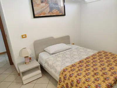 Letto o letti in una camera di Appartamento Maisonette