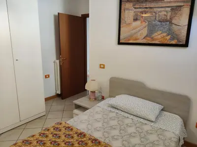 Letto o letti in una camera di Appartamento Maisonette