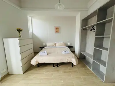 Letto o letti in una camera di Splendido Appartamento a Pavia