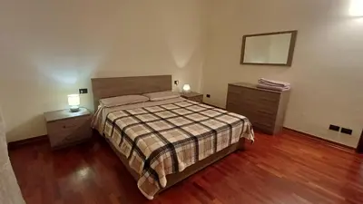 Letto o letti in una camera di La Casa INTANTO