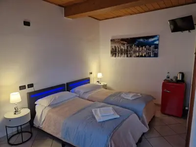 Letto o letti in una camera di Hotel IL Rifugio