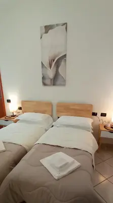 Letto o letti in una camera di Hotel IL Rifugio