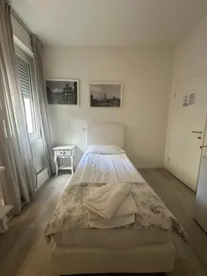 Letto o letti in una camera di Albergo del Pozzo