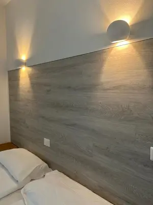 Letto o letti in una camera di Albergo del Pozzo