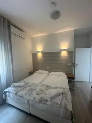 Letto o letti in una camera di Albergo del Pozzo