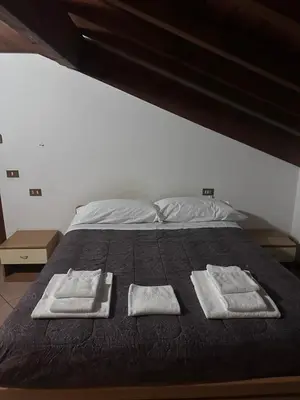Letto o letti in una camera di Dante 10 Flat