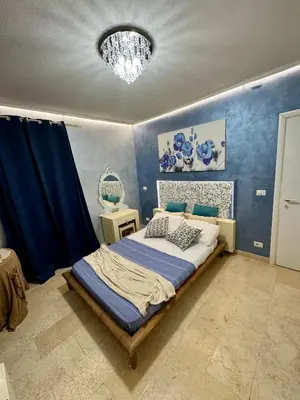 Letto o letti in una camera di Villa San Cataldo primo piano