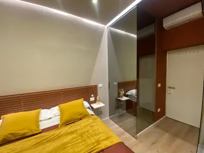 Letto o letti in una camera di Queen Room in pieno centro- Confort,Relax e Privacy