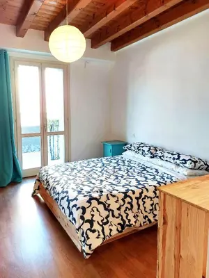 Letto o letti in una camera di CasaOlivier appartamento con giardino e biciclette