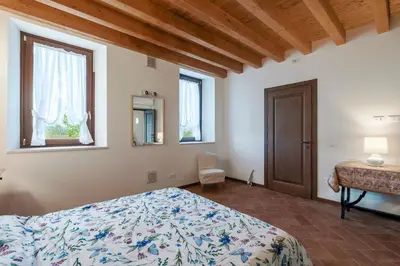 Letto o letti in una camera di Agriturismo Cascina Tavolette