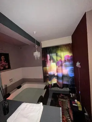Letto o letti in una camera di Spa suite Parma