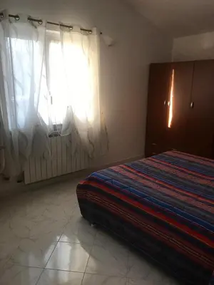 Letto o letti in una camera di Villa Santanna