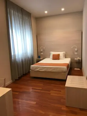 Letto o letti in una camera di Albergo Anelli