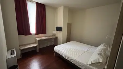 Letto o letti in una camera di Albergo Anelli