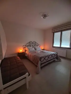 Letto o letti in una camera di Casa Emanuela Arceto Appartamento 1