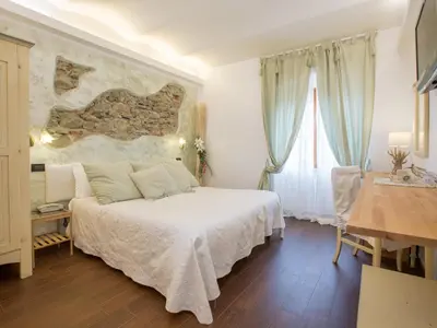 Letto o letti in una camera di Hotel Marina