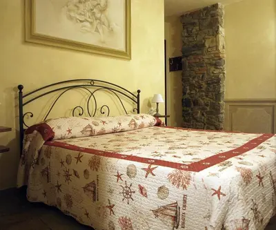 Letto o letti in una camera di Pietre di Mare