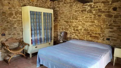 Letto o letti in una camera di Agriturismo Corte del Gallo