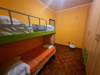 Letto o letti in una camera di Casa Via Asti