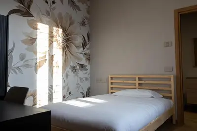 Letto o letti in una camera di Locanda Borgovecchio
