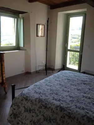 Letto o letti in una camera di La Corte del Borgo