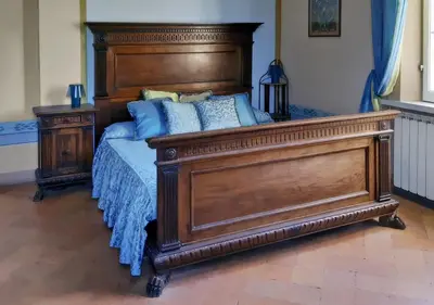 Letto o letti in una camera di Villa Adele