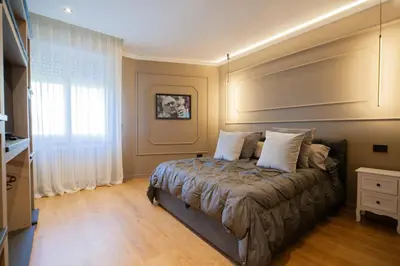 Letto o letti in una camera di MENTORE MAISON PRESTiGE