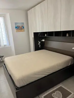 Letto o letti in una camera di Casa Stella di Mare