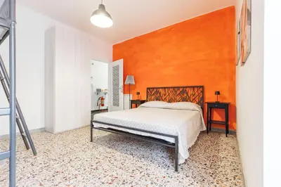 Letto o letti in una camera di La perla sul mare, Levanto
